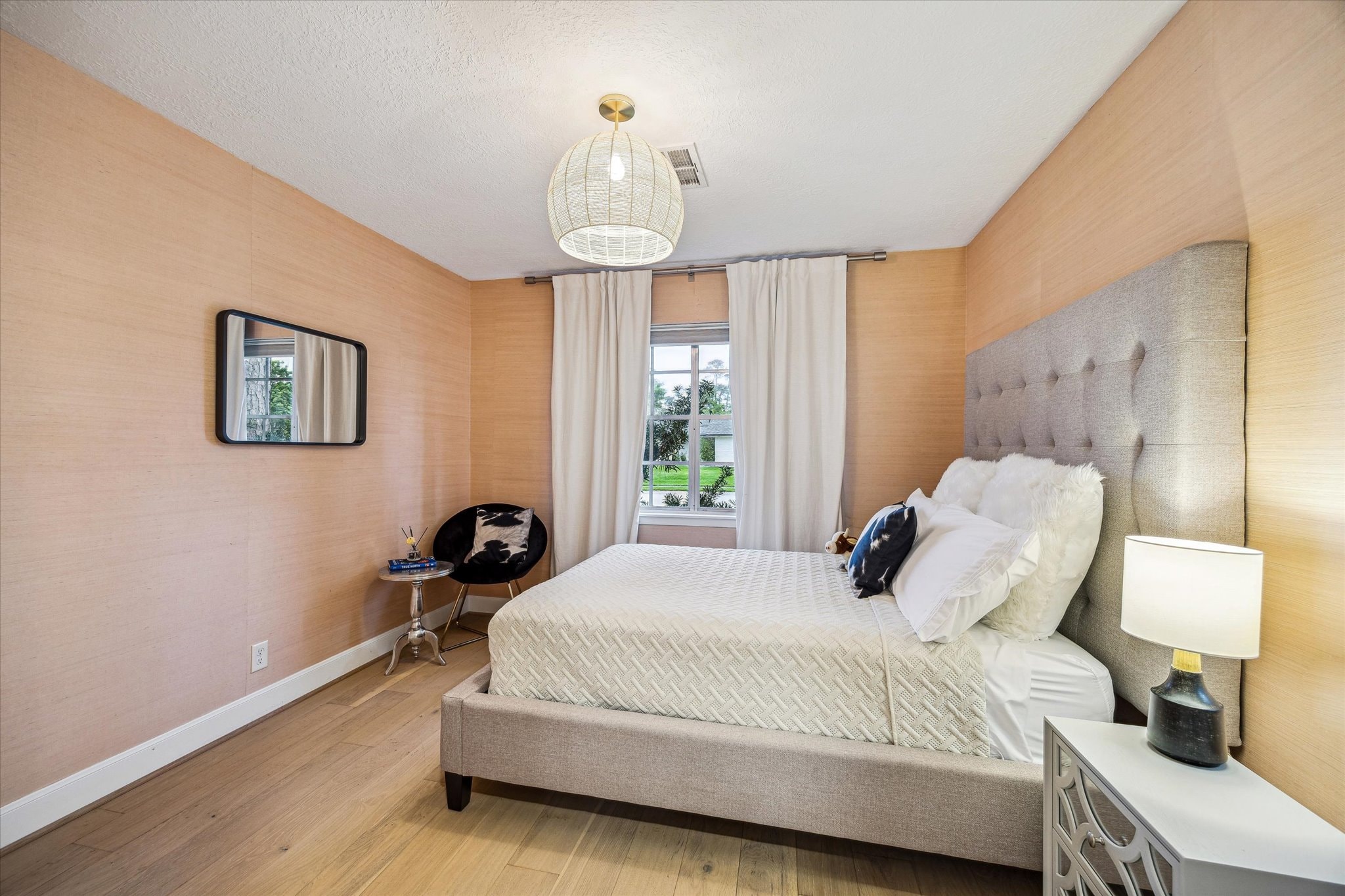 Bedroom 2 — tufted headboard