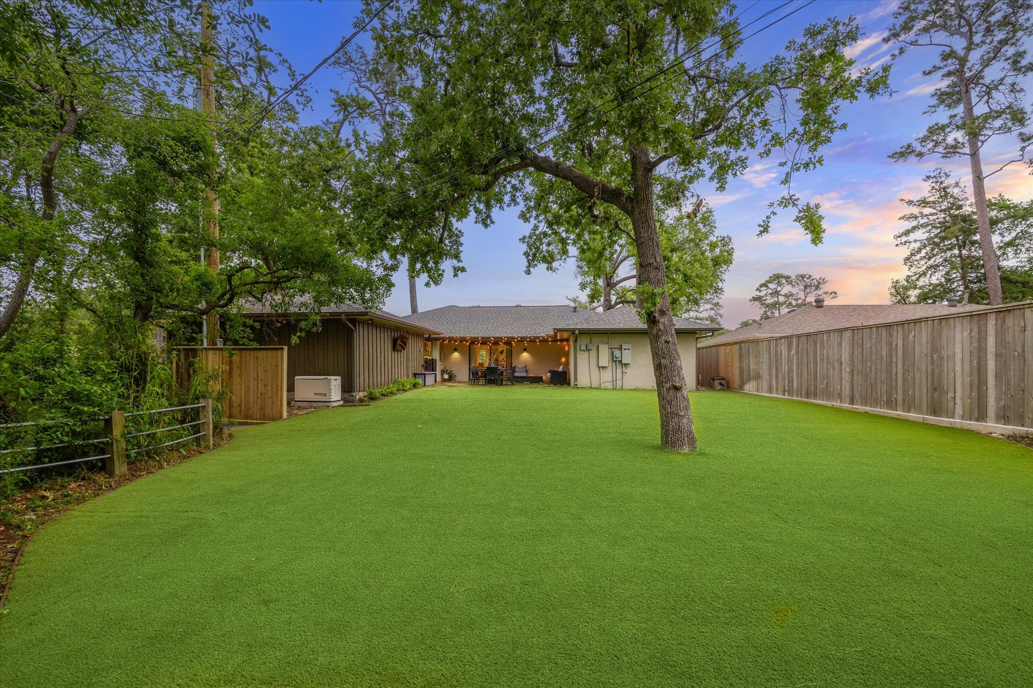 Side yard — vine-covered gate